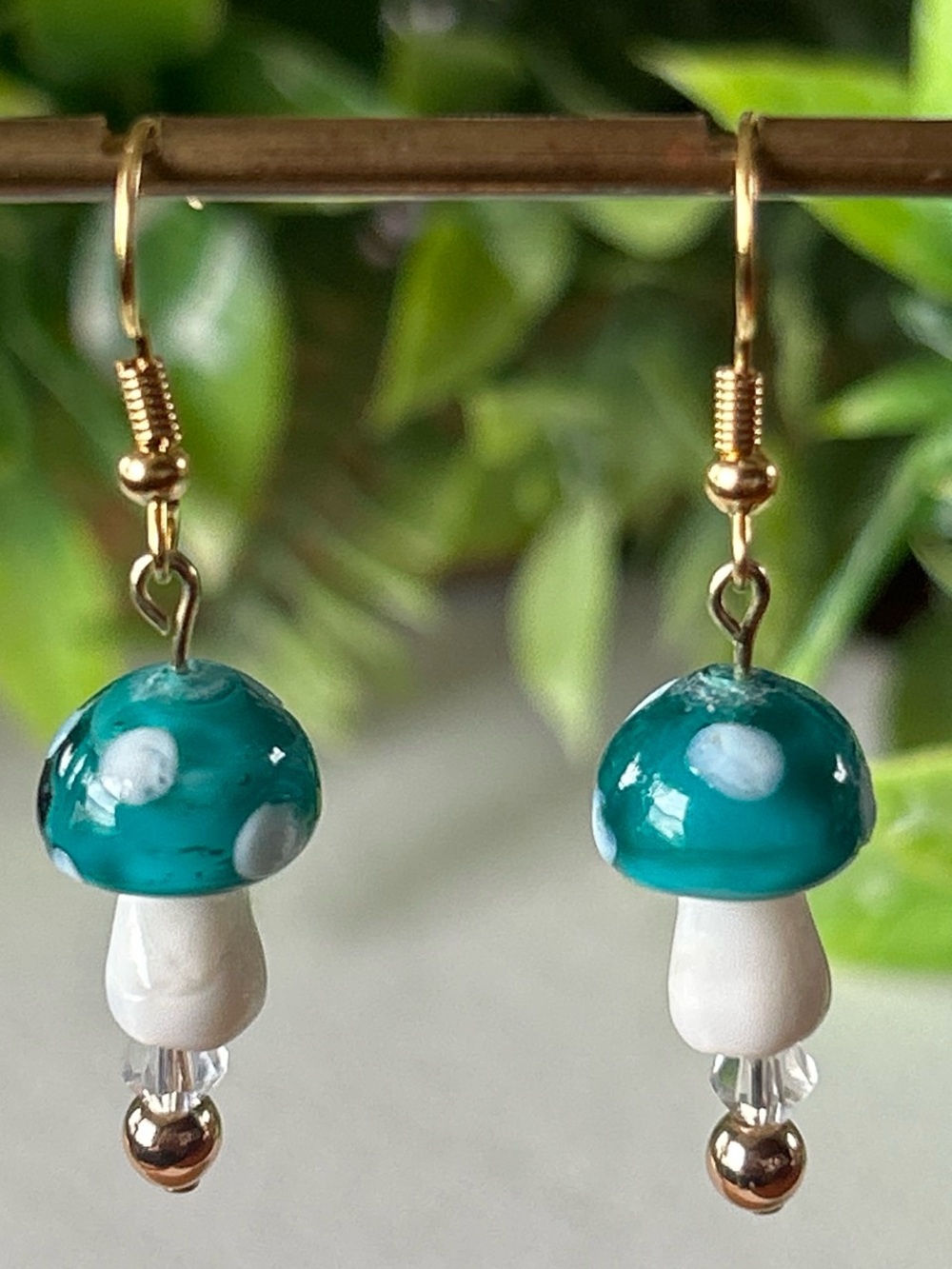 Handmade Teal Mushroom + Hematite Drop Earrings in gold